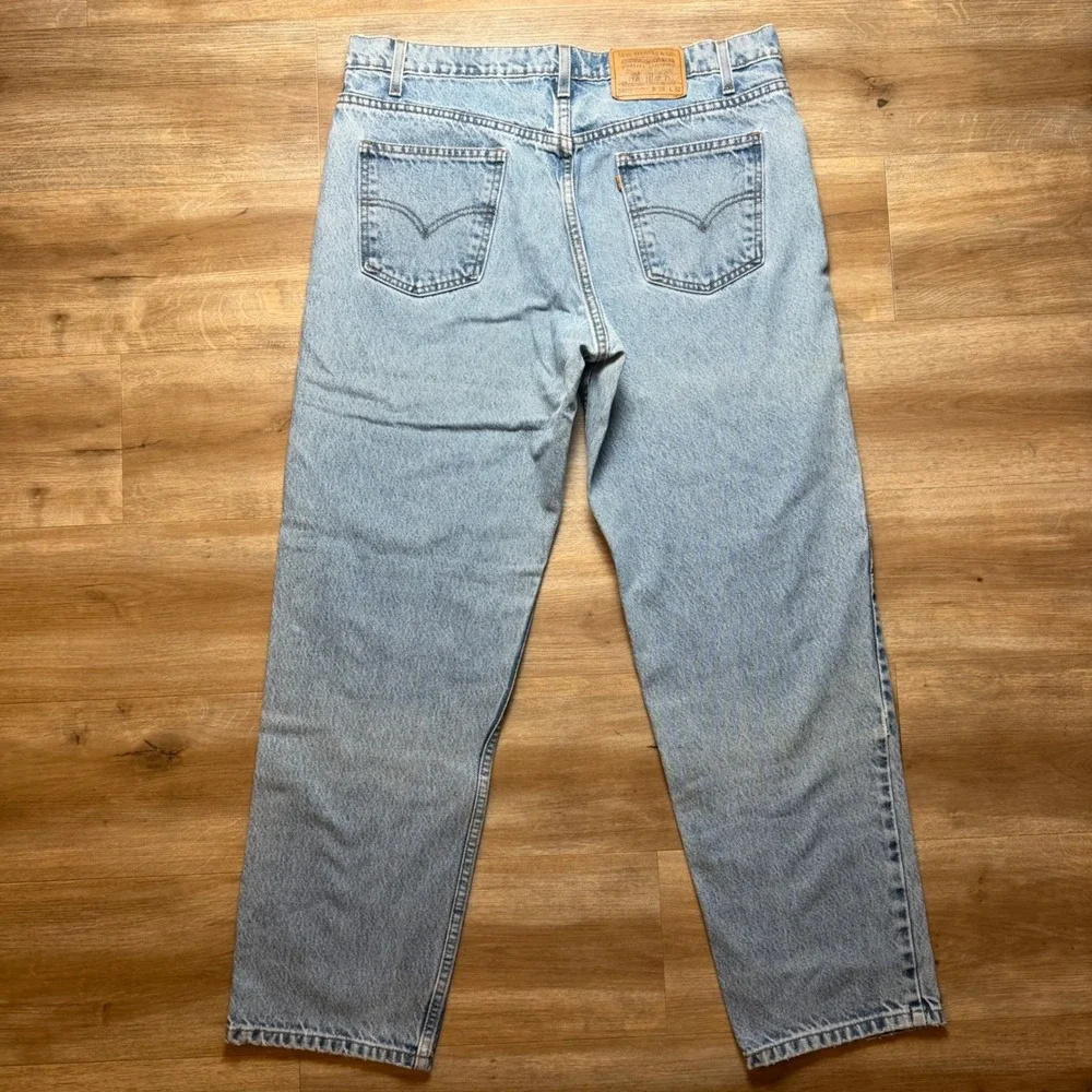 Vintage Levi's 550 Relaxed Fit Jeans Men 38x32 Light Wash Orange Tab Denim 1997